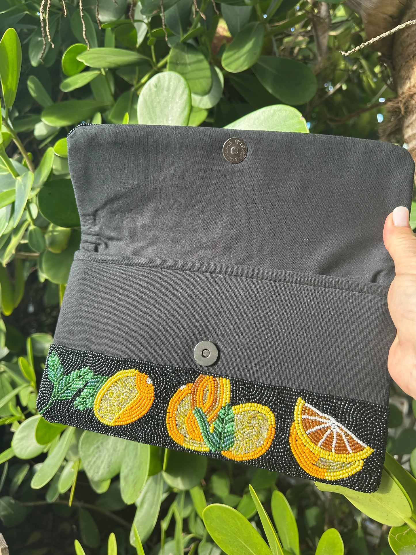 Lemon on Black Clutch