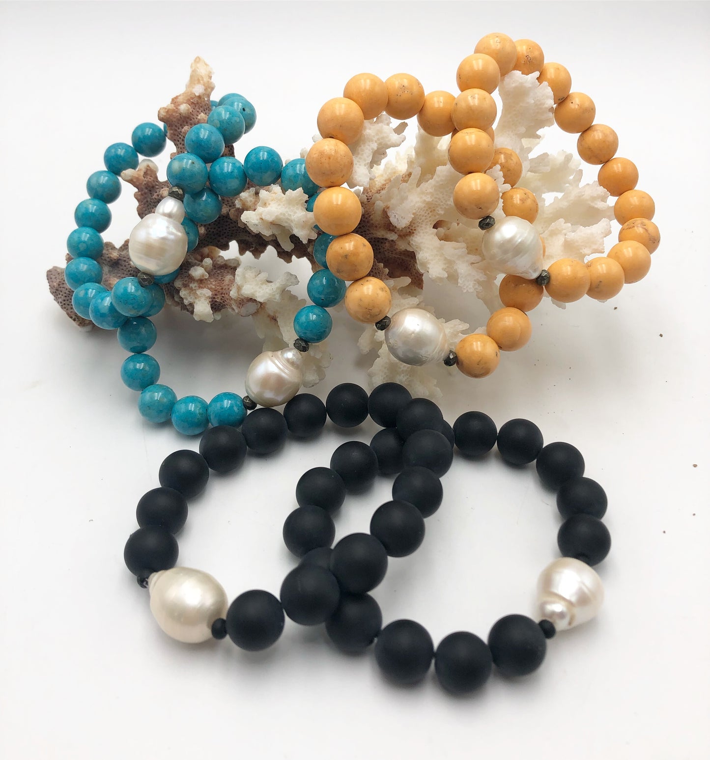 Stone stretch bracelets with baroque accent Blue Fossil, Orange Coral, Black Onyx.  Other stones available on request.